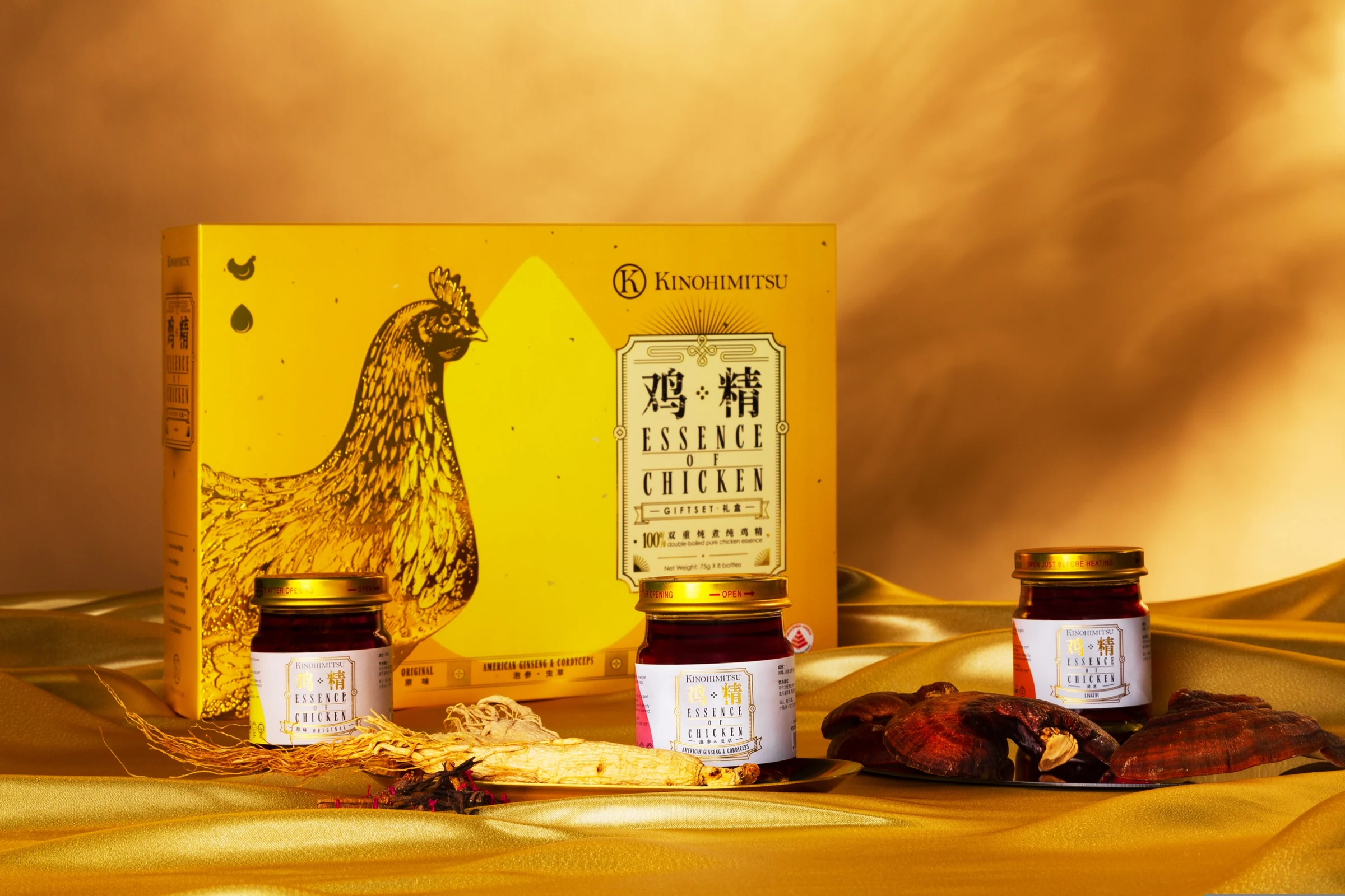 Three Kinohimitsu Essence of Chicken products in a warm still life